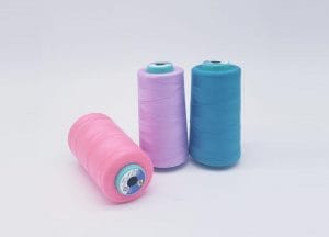 cone of dyed sewing thread