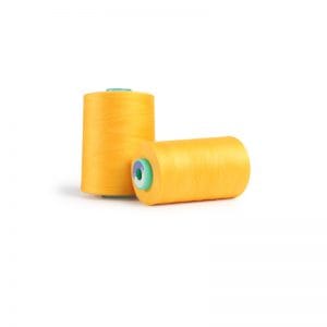Two bright orange thread spools with turquoise centers on a white background, one lying down and one standing upright.