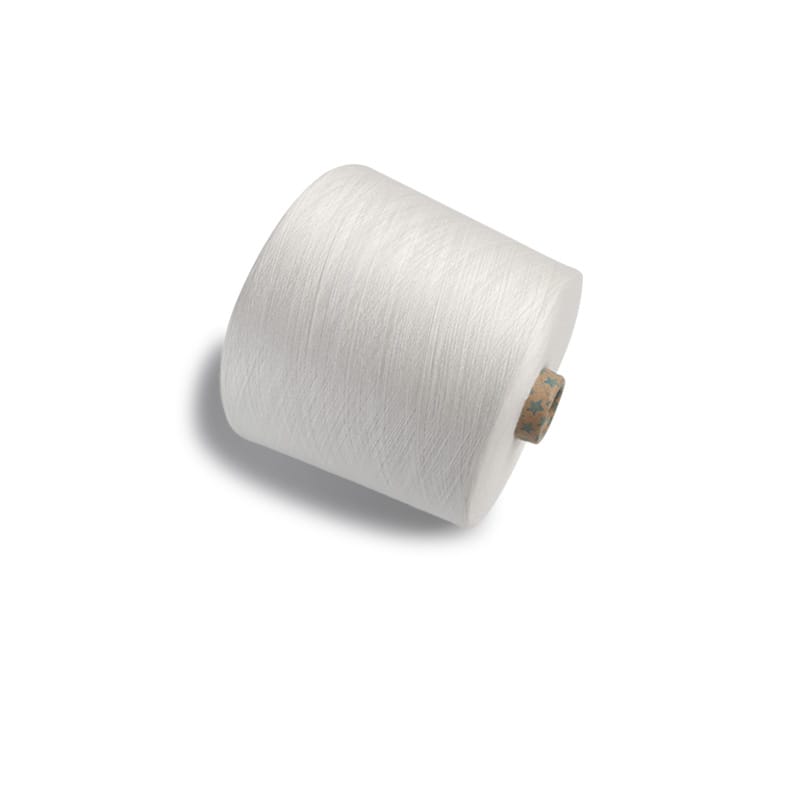 White spool of thread on a cardboard core