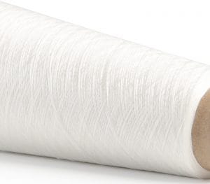 Close-up of a white rolled bandage with a textured fabric surface.