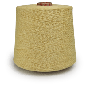 Cream-colored thread spool on a light surface, wound with yarn in neat crisscrosses (yarn skein)