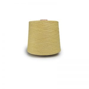 Cone of light beige yarn on a white background, ready for knitting or weaving