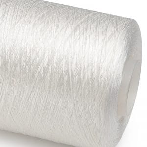 White spool of sewing thread wound around a plastic core, close-up view.