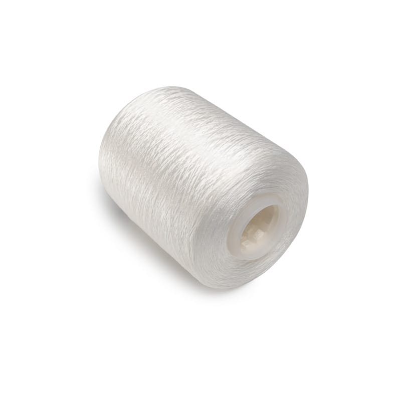 White thread wound on a plastic spool against a plain background.