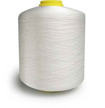 Large white thread spool with a yellow cap resting on a light surface.
