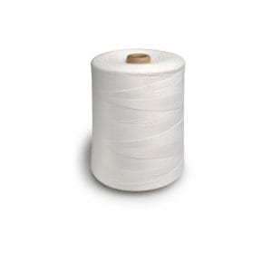Spool of white thread wound around a cardboard core on a white background