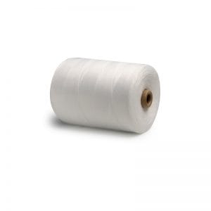 Spool of white sewing thread on a cardboard core against a white background